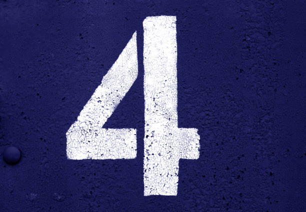 istock Number 4 in stencil on metal wall in blue tone. 1130888025