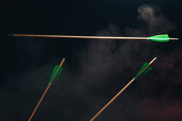 istock Three wood arrow one flying . Beautiful  smog background. Medieval weapons are handmade. 1130888907