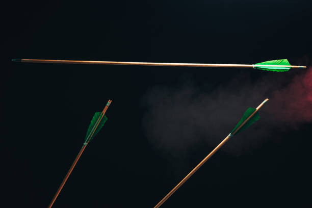 istock Three wood arrow one flying . Beautiful  smog background. Medieval weapons are handmade. 1130888960