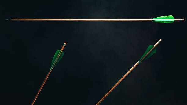 istock Three wood arrow one flying . Beautiful  smog background. Medieval weapons are handmade. 1130888978