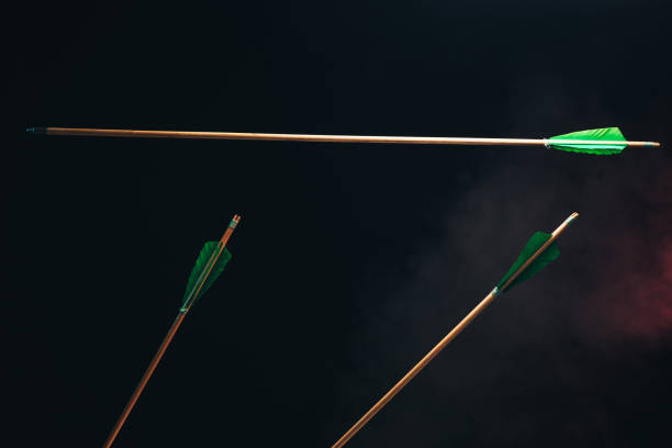 istock Three wood arrow one flying . Beautiful  smog background. Medieval weapons are handmade. 1130888988