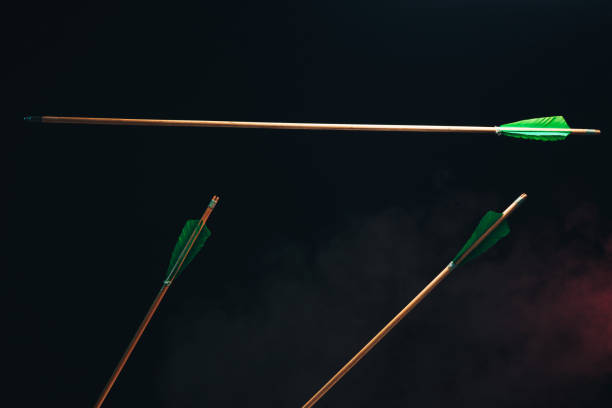 istock Three wood arrow one flying . Beautiful  smog background. Medieval weapons are handmade. 1130889034