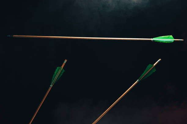 istock Three wood arrow one flying . Beautiful  smog background. Medieval weapons are handmade. 1130889120