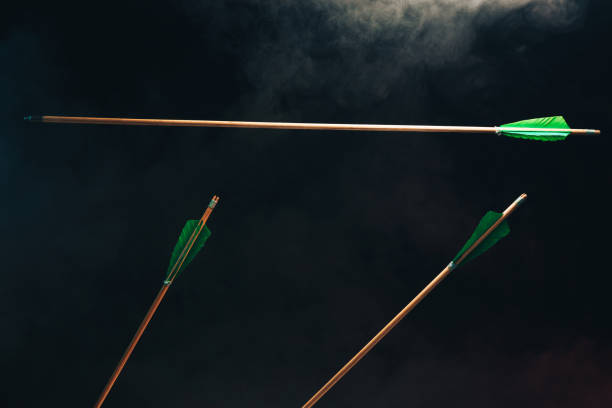 istock Three wood arrow one flying . Beautiful  smog background. Medieval weapons are handmade. 1130889162