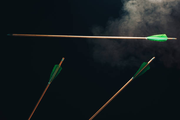 istock Three wood arrow one flying . Beautiful  smog background. Medieval weapons are handmade. 1130889176