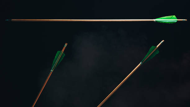 istock Three wood arrow one flying . Beautiful  smog background. Medieval weapons are handmade. 1130889336