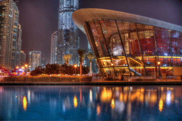 Dubai, UAE - January 29, 2019: District downtown. View of the New Dubai Opera house during night.