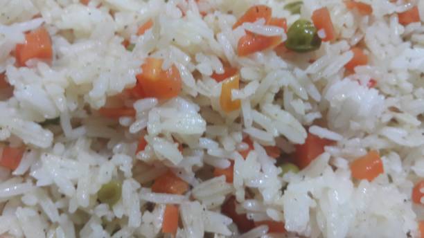 istock Basmati Rice Pulao or pulav with Peas, or vegetable rice using green peas 1130892960