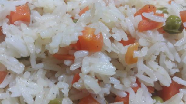 istock Basmati Rice Pulao or pulav with Peas, or vegetable rice using green peas 1130892964