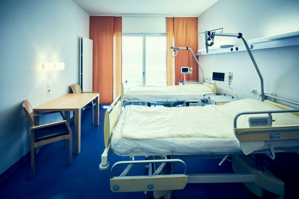 istock Room Hospital Bed Central Perspective 1130893084
