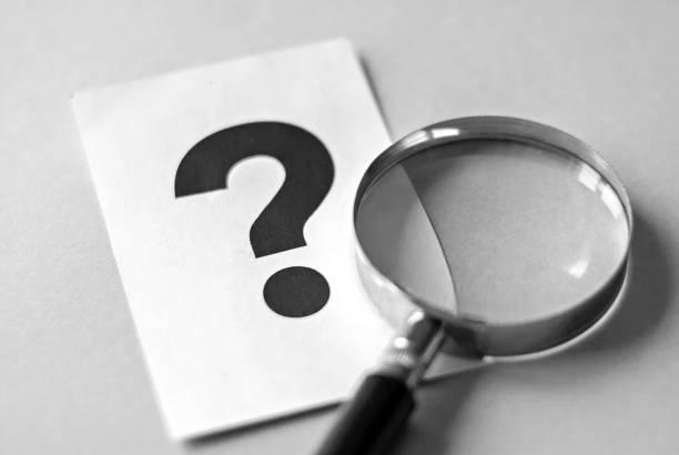 istock Magnifying glass and question mark search concept 1130893779