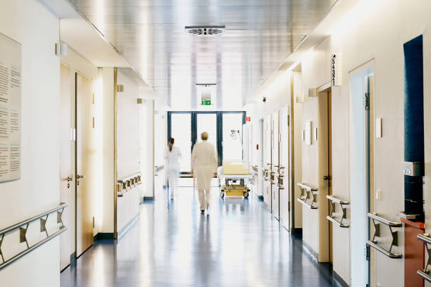 istock hospital doctor nurse blurred from behind 1130897183