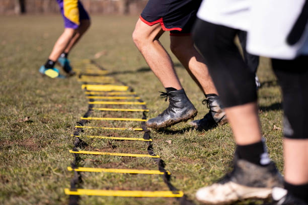 Exercising outdoors Male athletes exrcising outdoors. drill team stock pictures, royalty-free photos & images