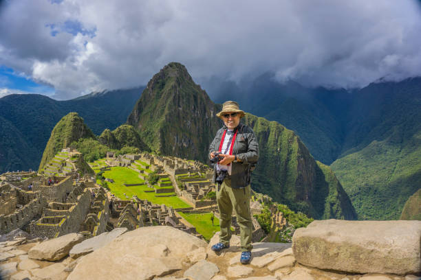 istock Photographer  at Machu Picchu 1130899913