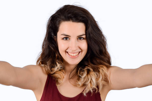 istock Young woman taking selfie 1130903058