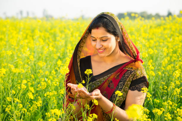 istock Smiling woman farmer - Stock image 1130904676