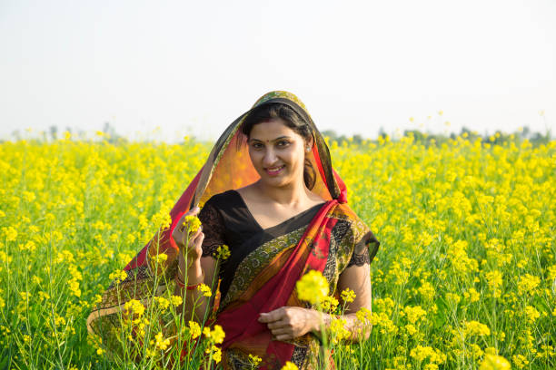 istock Smiling woman farmer - Stock image 1130905782