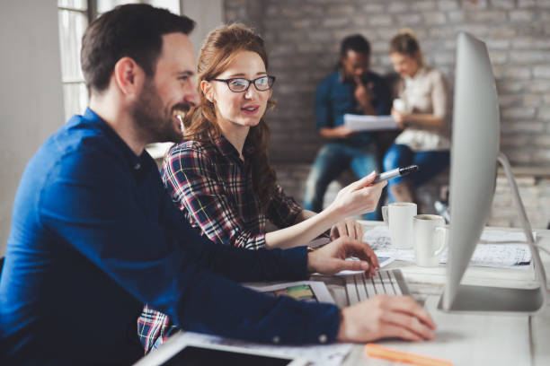 istock Picture of architects working together in office 1130905889