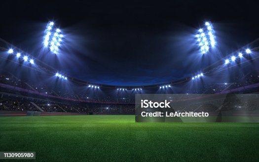 istock universal grass stadium illuminated by spotlights and empty green grass playground 1130905980