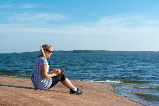 istock Woman on the beach 1130907242