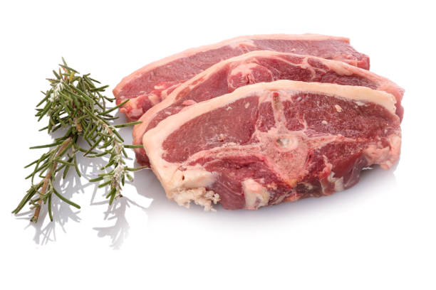 istock Lamb meat raw red with green herbs rosemary white isolated 1130908921