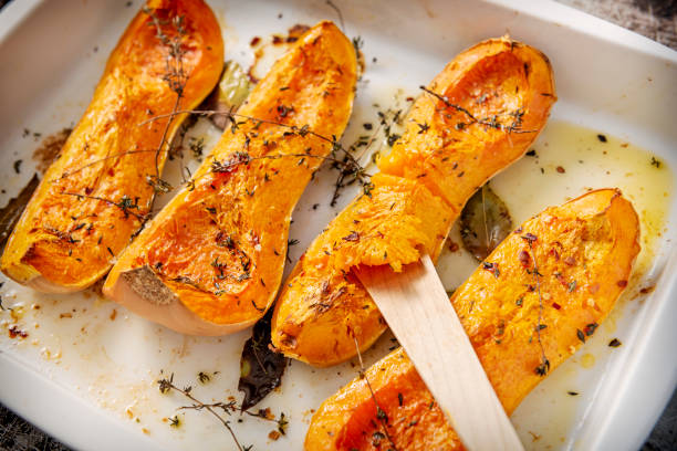 istock Dish of baked Butternut squashes ready to eat. 1130909155