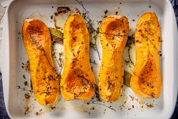 istock Dish of baked Butternut squashes ready to eat. 1130909197