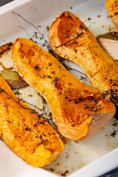 istock Dish of baked Butternut squashes ready to eat. 1130909947