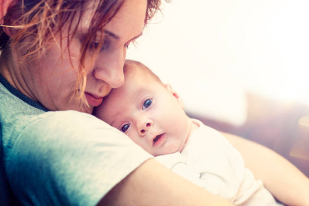 istock Mother embraces her child 1130911451