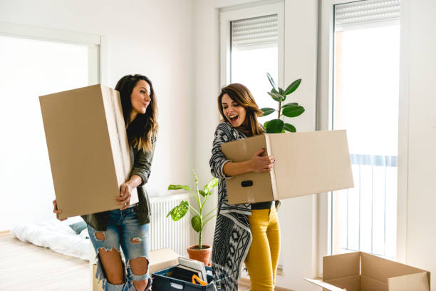 istock Lesbian couple moving into a new apartment 1130912030