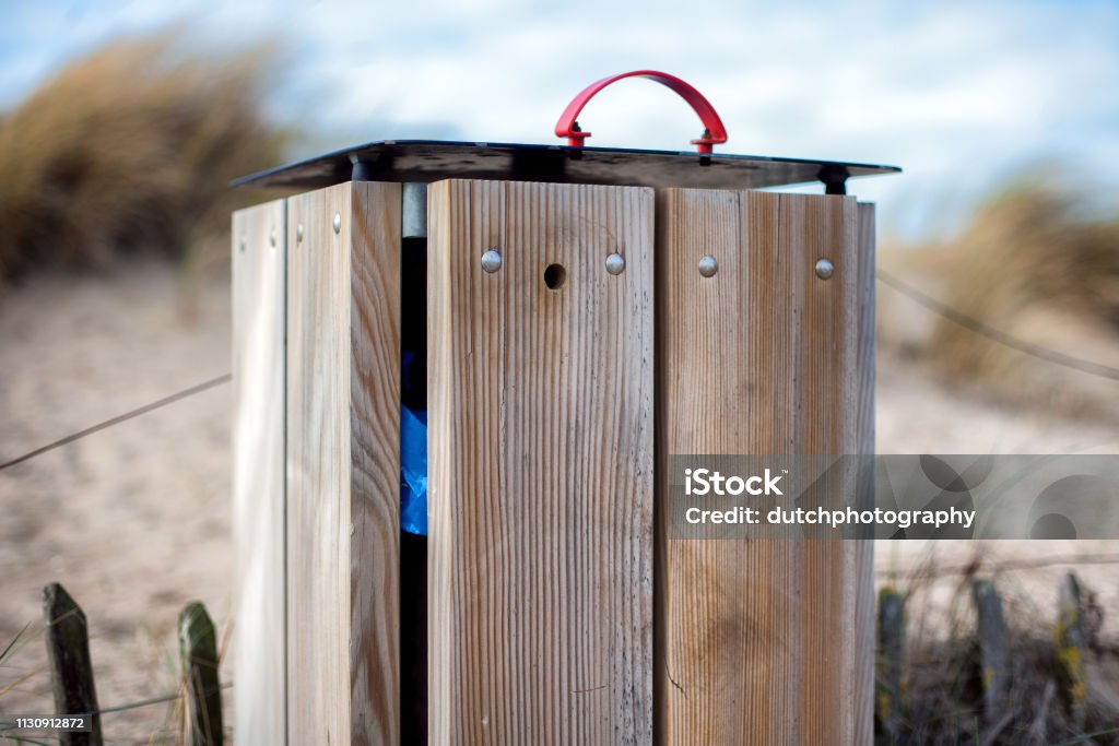 Waste container on the beach and dunes afvalcontainer op het strand en duinen Beach Stock Photo
