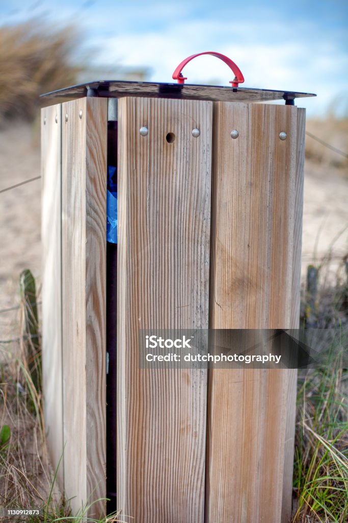 Waste container on the beach and dunes afvalcontainer op het strand en duinen Beach Stock Photo