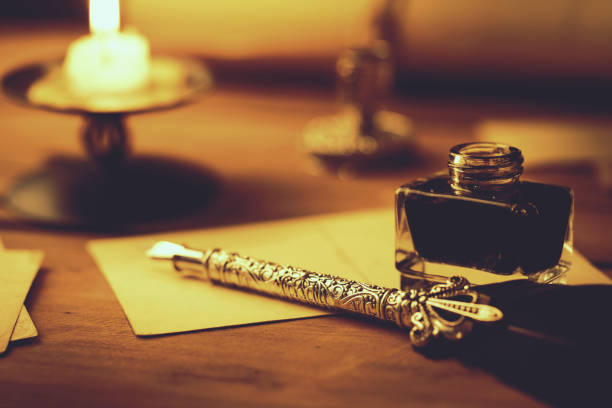 istock writing greeting card with vintage feather pen 1130913490