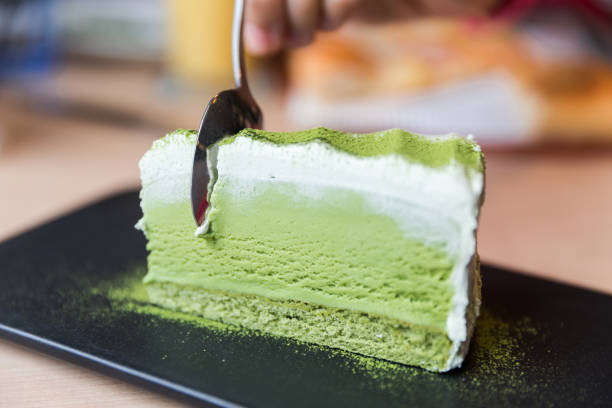 green tea cake - fat layer stock-fotos und bilder