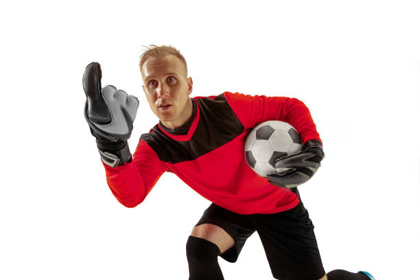 istock One soccer player goalkeeper isolated on white background 1130915848