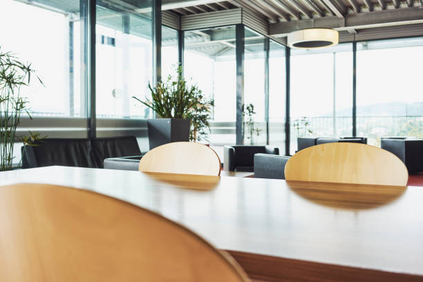 istock Glass front Chair Table Wood Green plant 1130917686