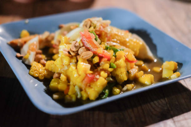 istock Spicy papaya salad with corn. Thai food 1130918341