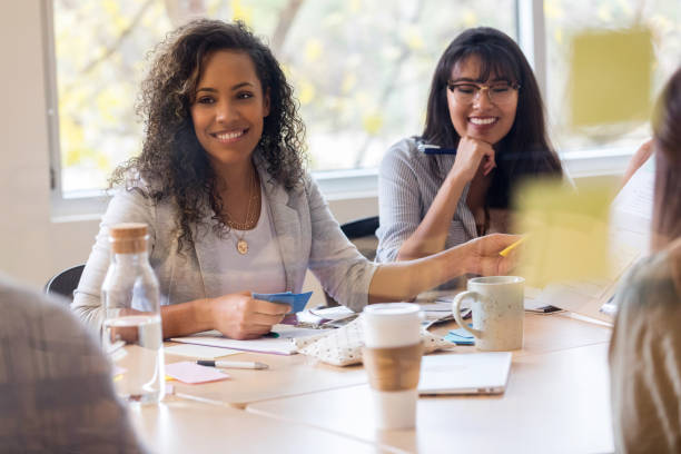 istock Confident businesswomen in meeting 1130920117