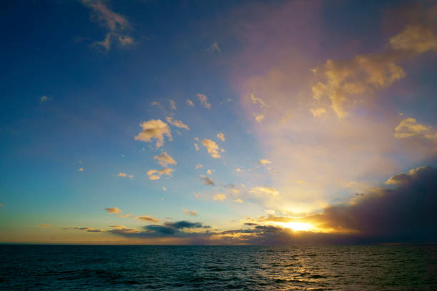 Dramatic seascape with clouds and sunbeams, Antarctica