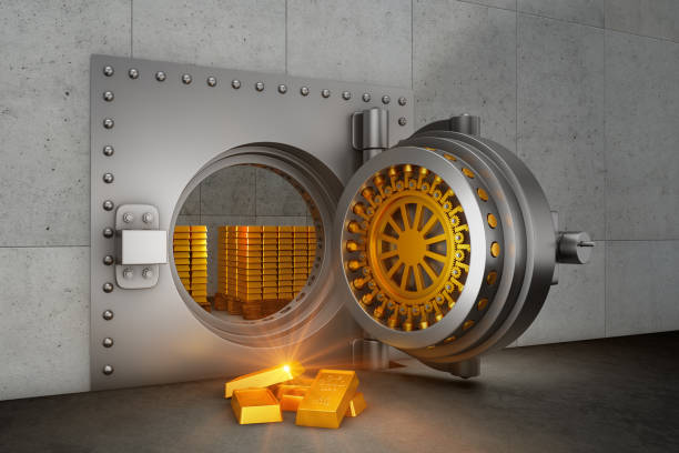 istock bank safe and gold bars 1130921771
