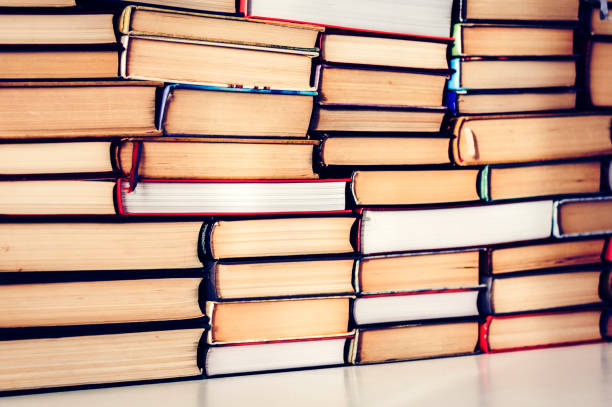 istock Stack of books education concept background, many books piles with copy space for text. 1130924219