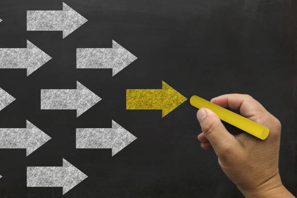 istock Leadership business competition arrow drawing blackboard 1130924912