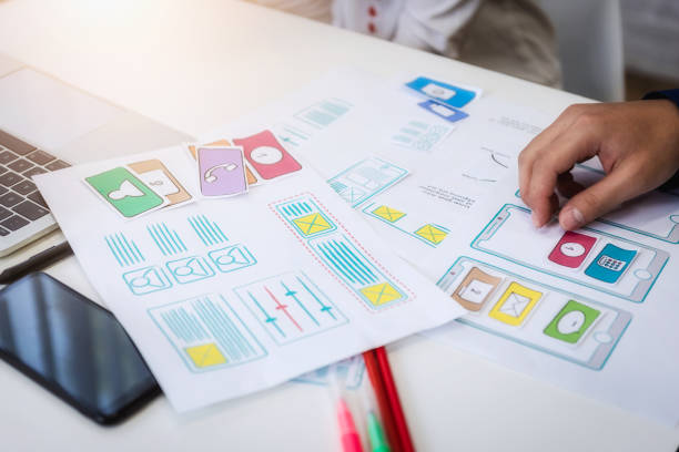 istock Closeup hand of graphic designer working about wireframe application designe in office. User experience concept. 1130927233