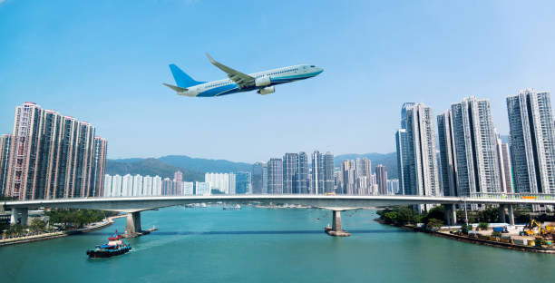 istock Airplane flying over the harbor 1130927875