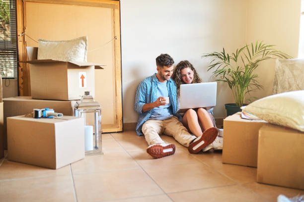istock Lets send out invitations to the house warming 1130929334