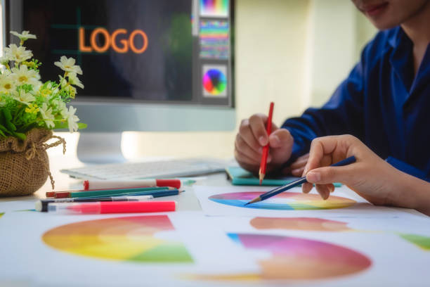 Designer graphic creative people meeting about new project website. graphics design concept.