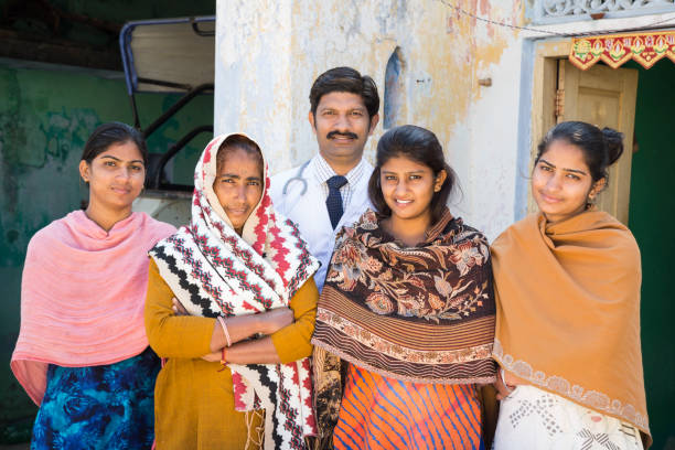 istock doctor doing social service in village 1130929883