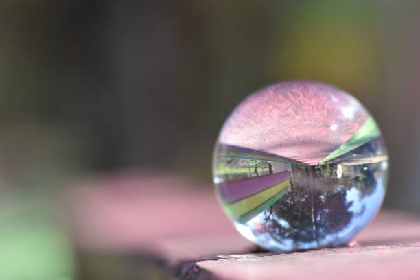 istock Colorful bench through a crystal ball 1130930598