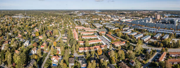 istock Flying over villa area, early fall day 1130931667