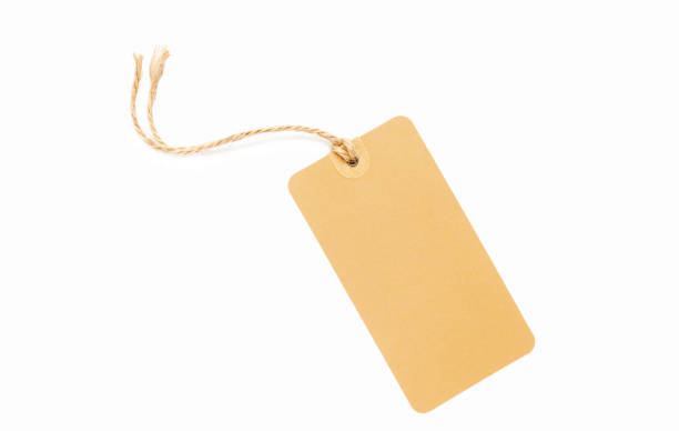 istock Blank brown cardboard Price tag or label isolated on a white background, File contains with clipping path. 1130936155